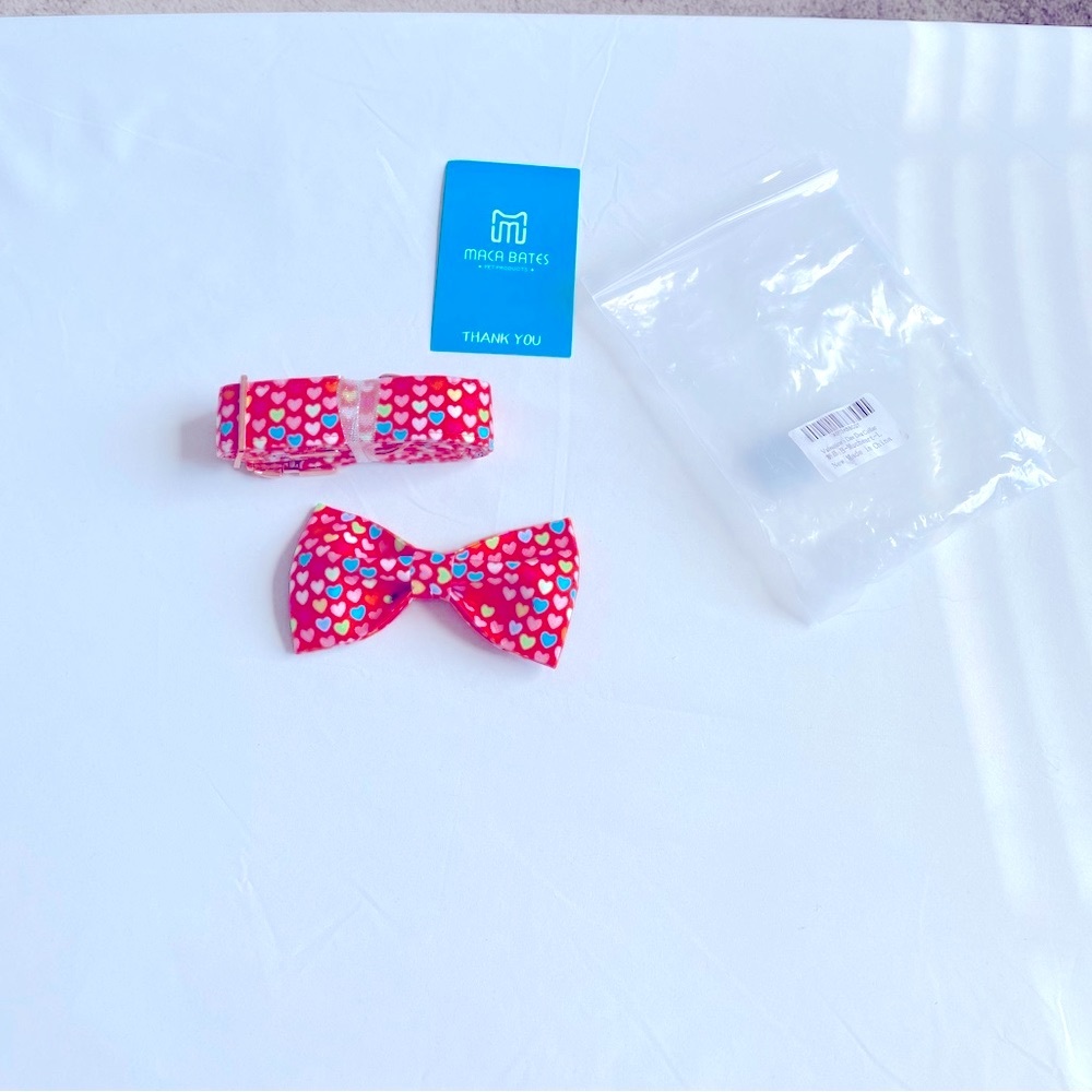 Dog Collar with at table Bow.  Ink with pastel Hearts.  New in Pkg.  Sz. L